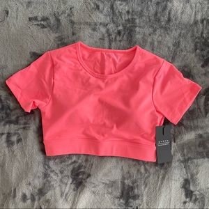 NVGTN | Open Back Tee in Coral